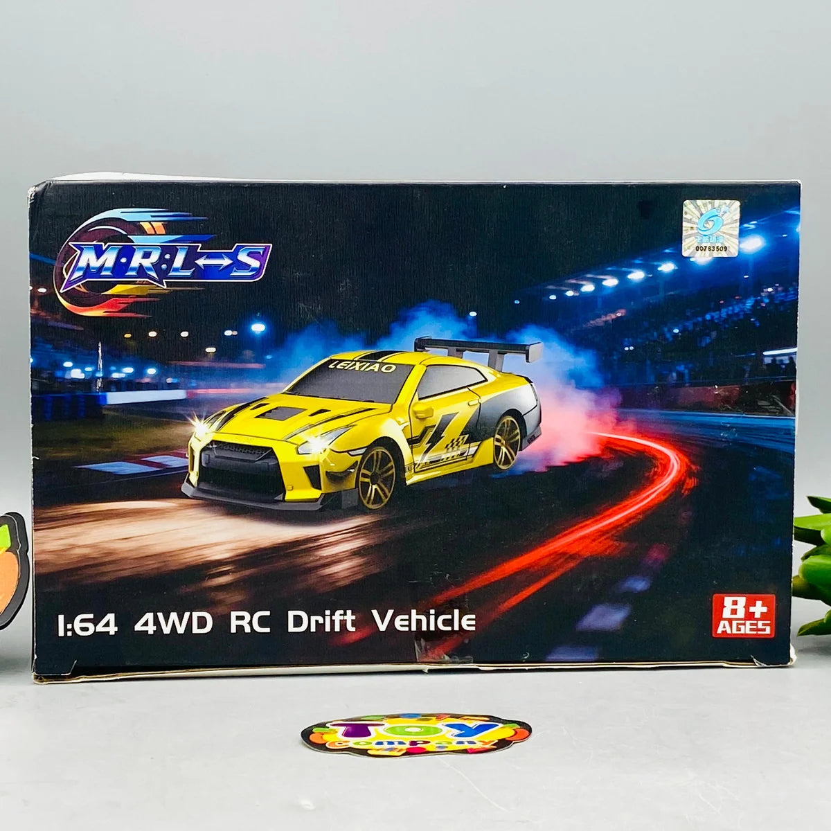 Mini remote control drift sports car with rear spoiler